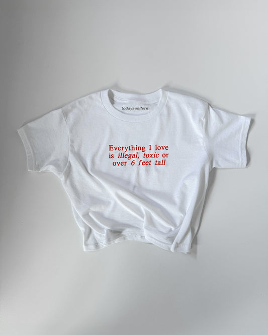 Embroidered 'EVERYTHING I LOVE IS ILLEGAL,TOXIC OR 6 FEET TALL' 90s Y2K T-Shirt