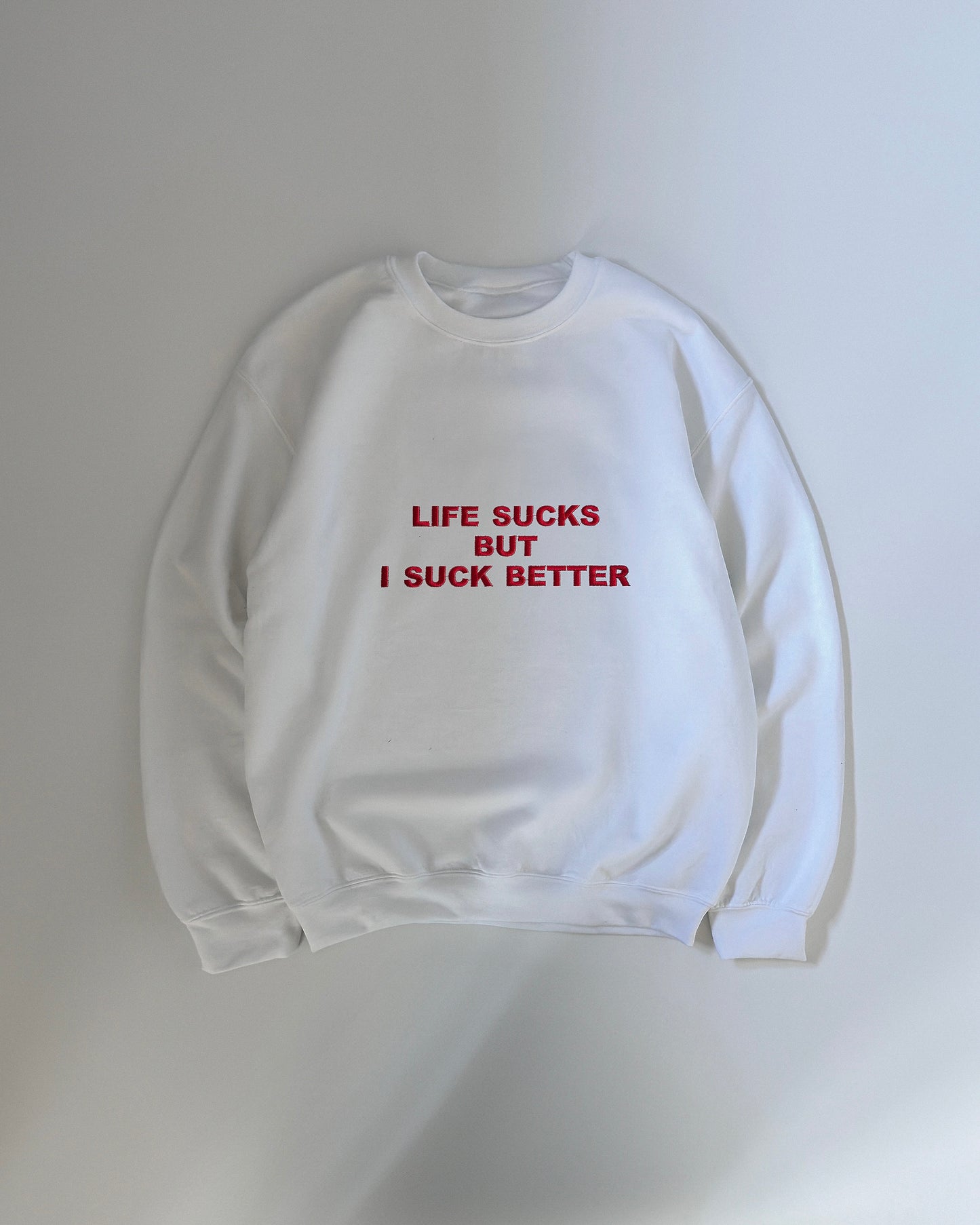 Embroidered ‘Life Sucks But I Suck Better’ Sweatshirt